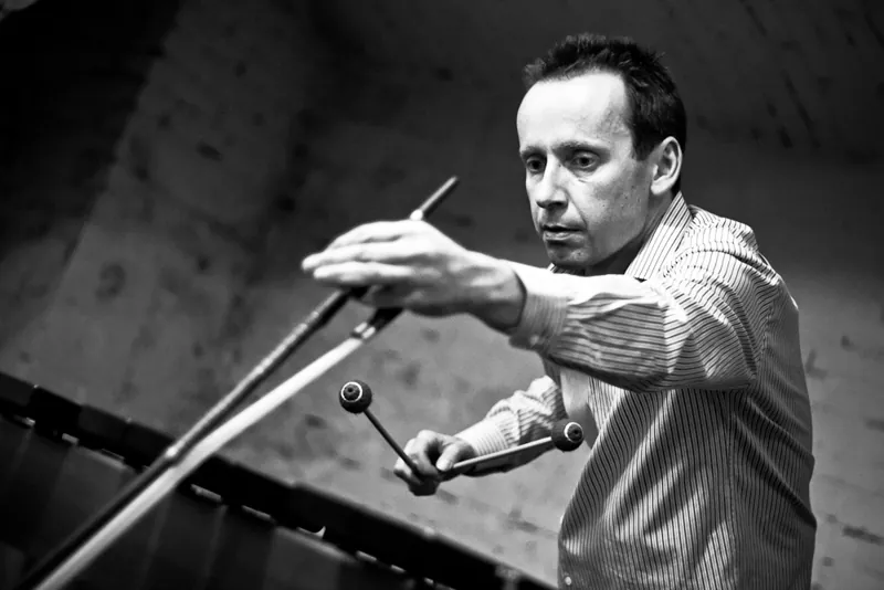 Martin Opršál with mallets, black and white